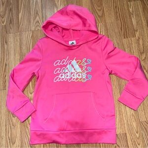 hot pink Adidas hoodie for girls featuring an overlapping logo design